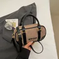 Brown suede bowling handbag with black leather straps and embroidered detail - No Pendant / Light Khaki