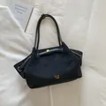 Retro black faux suede tote bag with contrast stitching and golden hardware detail - Black