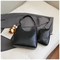 Minimalist black PU leather shoulder bag with matching pouch and brown bear charm accessory - Black With Pendant
