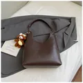 Minimalist deep brown faux leather tote bag with a cute plush bear charm for daily commute - Coffee With Pendant