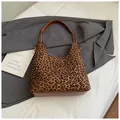 Stylish leopard print tote bag with brown leather handles and a reinforced base - Leopard Print No Charm