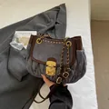 Vintage grey pleated shoulder bag with dark brown leather trim and golden rivets - Gray