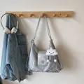 Silver metallic pleated shoulder bag with star detail and cloud charm accessory - Silver