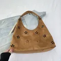 Caramel brown suede hobo tote bag featuring minimalist hollowed flower cutout patterns - Brown