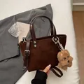 Brown faux suede tote bag with dog charm and adjustable strap for crossbody use - Coffee with Pendant