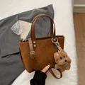 Brown suede tote bag with adjustable shoulder strap and cute plush puppy charm - Brown with Pendant