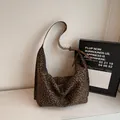 Large leopard print tote bag with adjustable brown leather straps and zip closure - Green