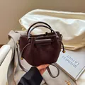Minimalist dark brown suede bucket bag with drawstring closure and golden hardware - Suede Coffee