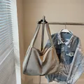 Minimalist silver metallic canvas tote bag with wide shoulder strap in shiny grey texture - Khaki