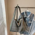 Minimalist grey-green canvas tote bag with wide strap for casual daily use - Green