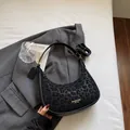 Black crescent hobo bag with leopard print flocking and adjustable shoulder strap - Black