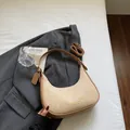 Beige leopard print crescent shoulder bag with golden brand logo and double straps - Khaki