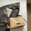 Apricot suede tote bag with brown leather accents and a cute teddy bear charm pendant - Cream White with Pendant