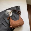 Brown leopard print crescent underarm bag with gold logo and adjustable shoulder strap - Brown