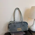 Retro washed blue denim tote bag with frayed metal logo and zipper closure detail - Dark Blue