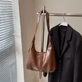 Chic brown PU leather crescent hobo bag with gold zipper and wide shoulder strap - Brown No Pendant