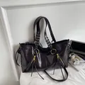 Retro dark brown oily leather tote bag with long tassels and adjustable shoulder strap - Coffee