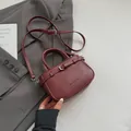 Chic burgundy leather handbag with top handle and adjustable strap for women - Red (No Pendant)