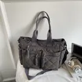 Minimalist large capacity quilted nylon tote bag with multiple pockets and shoulder strap - Gray