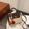 Vintage dark brown crossbody bag with beige plush heart embossed panel and pompom - Brown with Pendant
