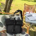 Schwarze Messenger-Tasche aus Nylon mit Karomuster und Schnalle für Damen - Schwarz