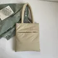 Beige gewatteerde puffer draagtas in casual stijl voor dagelijks en campusgebruik - Abrikoos