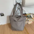 Chic quilted tote bag in grey-brown nylon with double front pockets and leather label - No Pendant / Gray