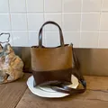 Vintage brown patchwork bucket bag in matte and glossy leather with an adjustable strap - Brown No Pendant
