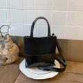 Black bucket handbag with matte suede contrast and adjustable leather shoulder strap - Black without Pendant
