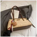 Retro tote bag in beige and dark brown with a plush bear charm and woven rope detail - With Pendant / Off White