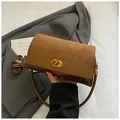 Brown retro shoulder bag with suede拼接 and gold oval twist lock closure for women - Brown