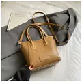 Chic caramel brown straw woven crossbody bag with top handles and adjustable strap - Woven Design / Khaki (Without Charm)