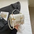 Chic milky white square handbag with marble texture and elegant gold hardware - Off-white