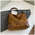 Brown suede tote bag with leather patchwork and adjustable strap in minimalist style - Brown