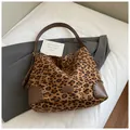 Retro leopard print faux suede hobo bag with brown leather strap and stitching detail - Leopard Brown