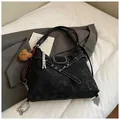 Matte black vintage tote bag with white contrast stitching and a cute bear charm - With Charm / Black