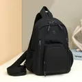 Black durable nylon multi-zipper backpack with premium metal logo and adjustable strap - Black