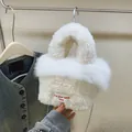 White faux fur basket bag with embroidered quote label and thin metal chain strap - White