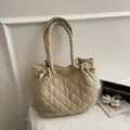 Beige quilted tote bag with large capacity and drawstring detail for winter - Khaki