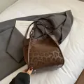 Stijlvolle bucket bag met luipaardprint, lederen handvatten en verstelbare schouderband - Zonder Hanger / Bruin