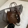 Sac seau imprimé léopard marron avec poignées rondes et pendentif décoratif - Avec Pendentif / Marron
