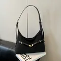 Minimalist black matte hobo bag with a gold metal buckle and adjustable shoulder strap - No Pendant Style / Black
