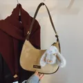 Khaki suede shoulder bag with brown leather trim and a cute plush rabbit pendant - With Pendant / Apricot