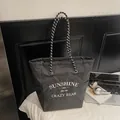 Minimalist black and white checkered canvas tote bag with woven handles for daily use - Black Large