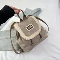Detail of khaki corduroy backpack with drawstring, plush trim and BEAR patch - Khaki