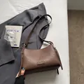 Brown lychee-textured leather shoulder bag with vintage gold hardware and logo - Brown No Pendant