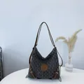 Minimalist grey quilted tote bag with brown leather straps and M logo detail - Black