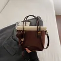 Brown faux suede tote bag with white faux fur trim and fashion brand lettering - Brown with Pendant