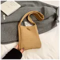 Minimalist camel knit crossbody bag with wooden button closure for women in winter - Khaki