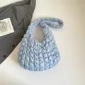 Light blue pleated cloud tote bag with puffy quilted texture and hobo shoulder design - Blue